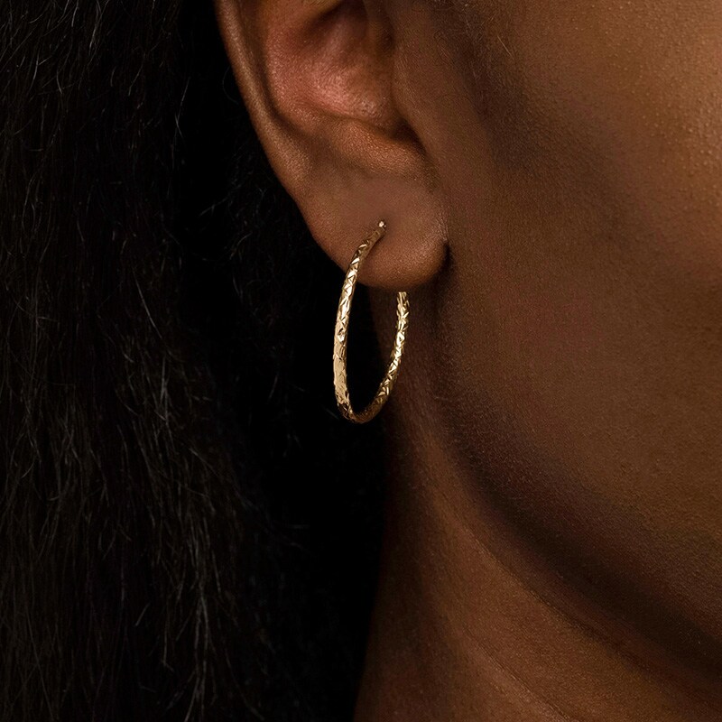 Main Image 2 of Previously Owned - 30.0mm Diamond-Cut Inside-Out Tube Oval Hoop Earrings in Hollow 10K Gold