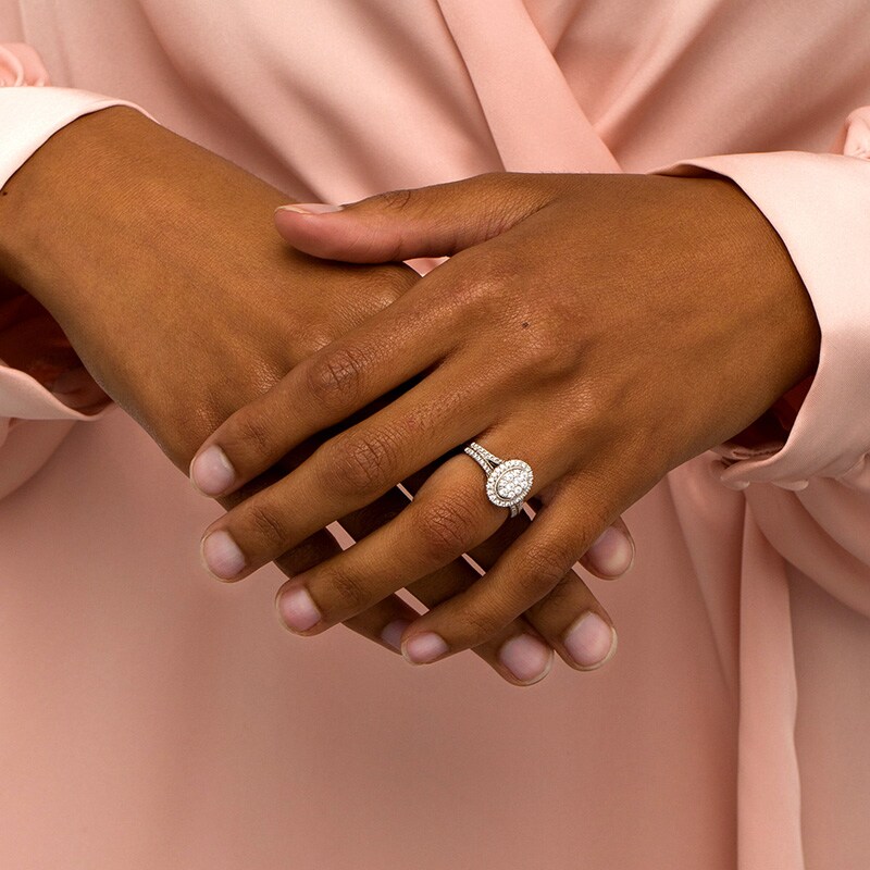 Main Image 2 of Previously Owned - 1/2 CT. T.W. Oval Multi-Diamond Frame Split Shank Engagement Ring in 10K White Gold