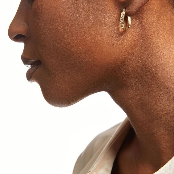 Previously Owned - Diamond-Cut Oval Tube Hoop Earrings in 14K Gold