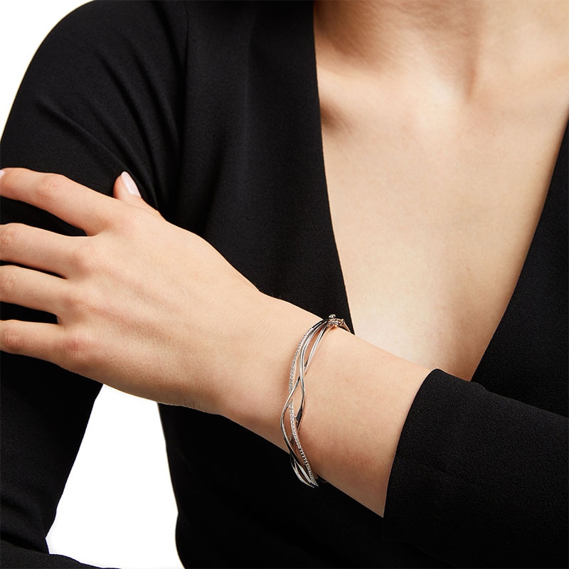 Main Image 2 of Previously Owned - 1/5 CT. T.W. Diamond Intertwined Bangle in Sterling Silver