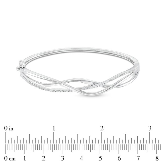 Previously Owned - 1/5 CT. T.w. Diamond Intertwined Bangle in Sterling Silver