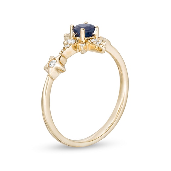 Previously Owned - Blue Sapphire and 1/10 CT. T.w. Diamond Double Star Ring in 10K Gold