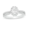 Thumbnail Image 1 of Previously Owned - 3/4 CT. T.W.  Oval Diamond Frame Engagement Ring in 14K White Gold (I/I2)