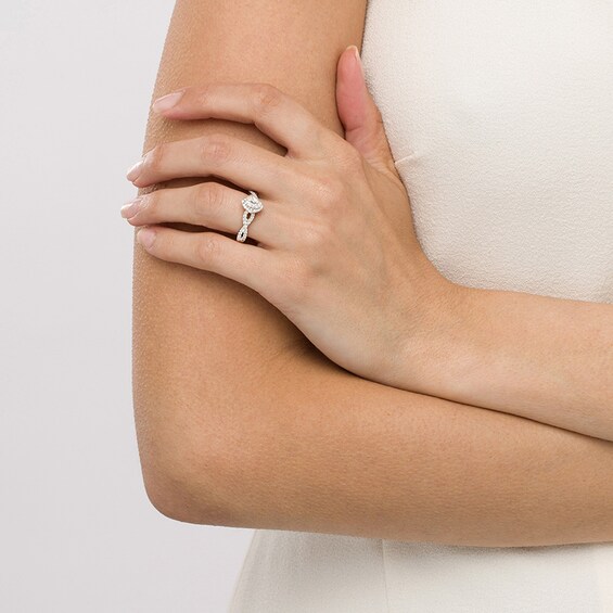 Previously Owned - Celebration Infiniteâ¢ 1 CT. T.w. Oval Diamond Frame Engagement Ring in 14K White Gold (I/Si2)