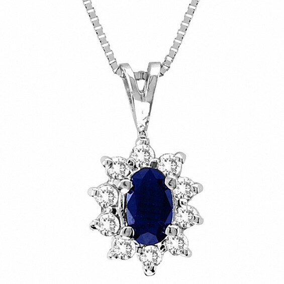 Previously Owned - Oval Blue Sapphire and 1/8 CT. T.w. Diamond Pendant in 14K White Gold - 16"