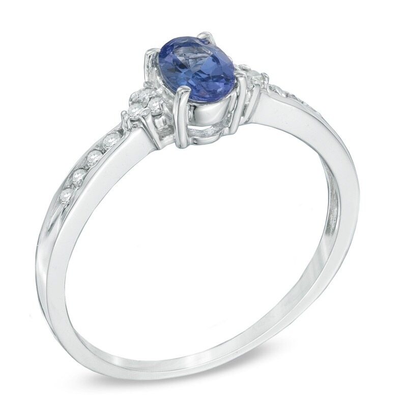 Main Image 2 of Previously Owned - Oval Tanzanite and 1/10 CT. T.W. Diamond Frame Engagement Ring in 14K White Gold