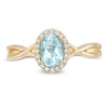 Thumbnail Image 4 of Previously Owned - Oval Swiss Blue Topaz and 1/15 CT. T.W. Diamond Frame Twist Shank Ring in 10K Gold