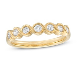 Previously Owned - 1/3 CT T.W. Diamond Twist Stackable Band in 10K Gold