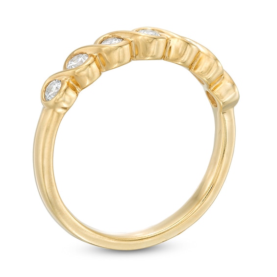 Previously Owned - 1/3 CT T.w. Diamond Twist Stackable Band in 10K Gold