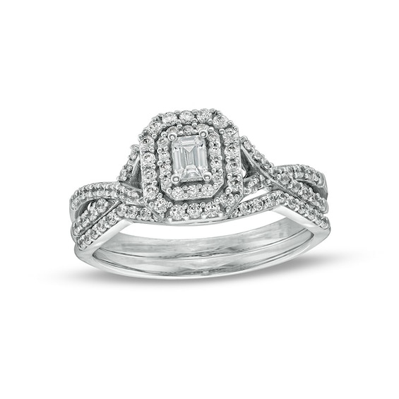 Previously Owned - 5/8 CT. T.w. Emerald-Cut Diamond Frame Bridal Set in 10K White Gold (I/I1)