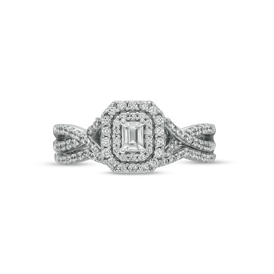 Previously Owned - 5/8 CT. T.w. Emerald-Cut Diamond Frame Bridal Set in 10K White Gold (I/I1)