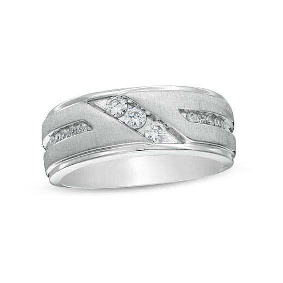 Previously Owned - 1/3 CT. T.w. Diamond Three Stone Slant Wedding Band in 10K White Gold