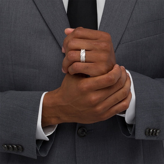 Previously Owned - 1/3 CT. T.w. Diamond Three Stone Slant Wedding Band in 10K White Gold
