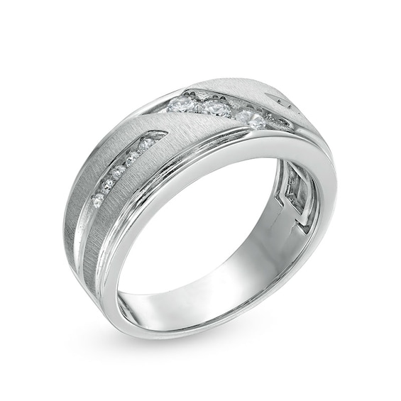 Previously Owned - 1/3 CT. T.w. Diamond Three Stone Slant Wedding Band in 10K White Gold