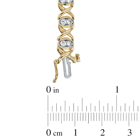 Previously Owned - 2 CT. T.w. Diamond "X" and "O" Bracelet in 10K Gold