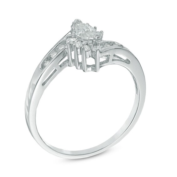 Previously Owned - 1/3 CT. T.w. Marquise Diamond Frame Bypass Engagement Ring in 10K White Gold