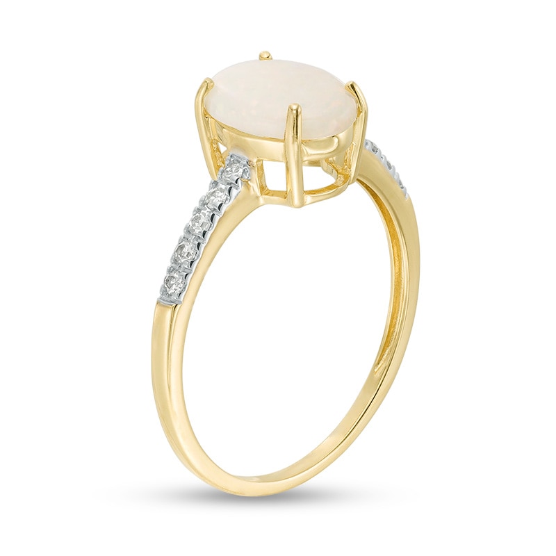 Main Image 2 of Previously Owned - Oval Opal and 1/10 CT. T.W. Diamond Engagement Ring in 14K Gold