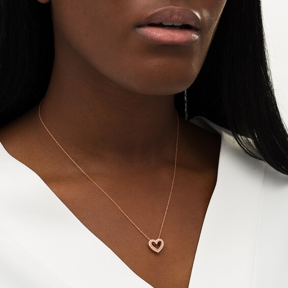 Previously Owned - 1/5 CT. T.w. Diamond Heart Outline Pendant in 10K Rose Gold