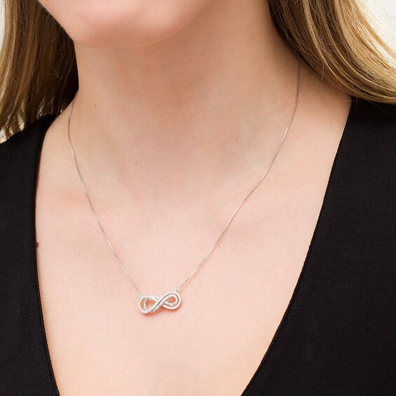 Previously Owned - 1/4 CT. T.w. Diamond Sideways Layered Infinity Necklace in Sterling Silver