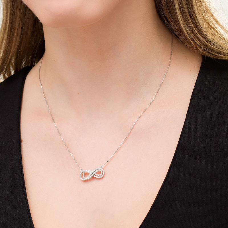 Main Image 2 of Previously Owned - 1/4 CT. T.W. Diamond Sideways Layered Infinity Necklace in Sterling Silver