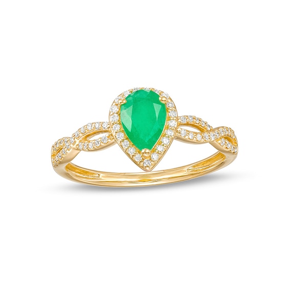 Previously Owned - Pear-Shaped Emerald and 1/6 CT. T.w. Diamond Frame Twist Shank Ring in 10K Gold