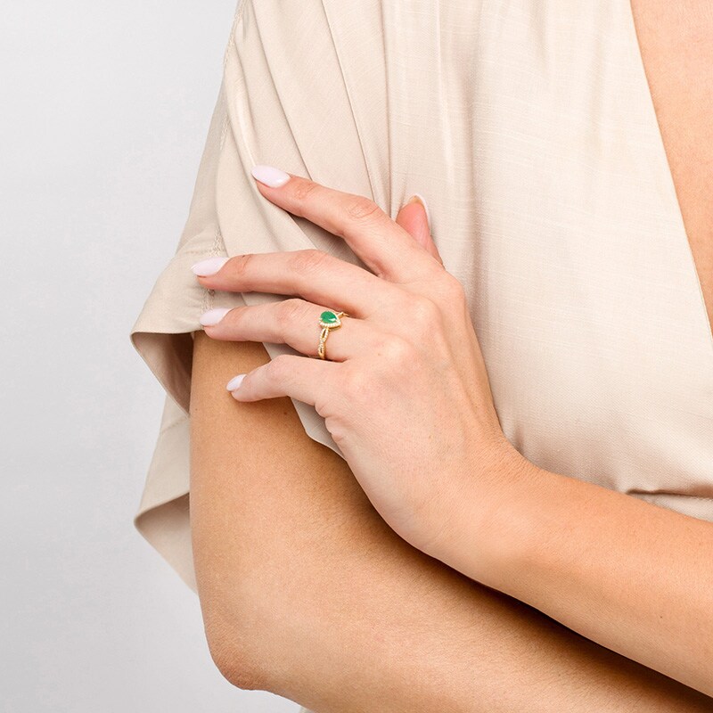 Main Image 2 of Previously Owned - Pear-Shaped Emerald and 1/6 CT. T.W. Diamond Frame Twist Shank Ring in 10K Gold