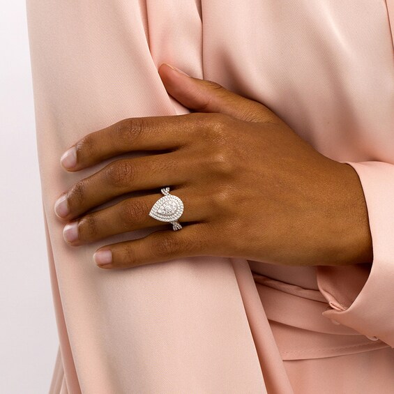 Previously Owned - 1 CT. T.w. Diamond Pear-Shaped Double Frame Engagement Ring in 10K White Gold (J/I3)