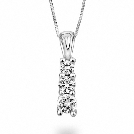 Previously Owned - 1/5 CT. T.w. Diamond Three Stone Pendant in 14K White Gold