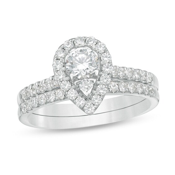 Previously Owned - 1 CT. T.w. Pear-Shaped Multi-Diamond Frame Bridal Set in 10K White Gold