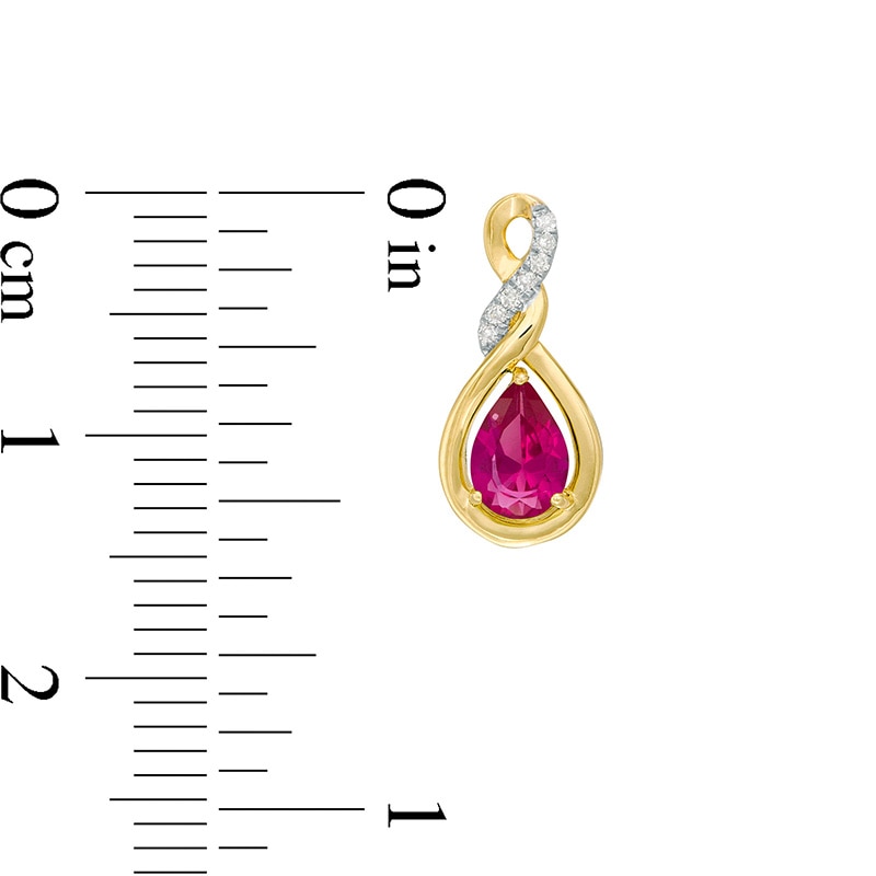 Main Image 3 of Previously Owned - Pear-Shaped Lab-Created Ruby and 1/20 CT. T.W. Diamond Cascading Teardrop Earrings in 10K Gold
