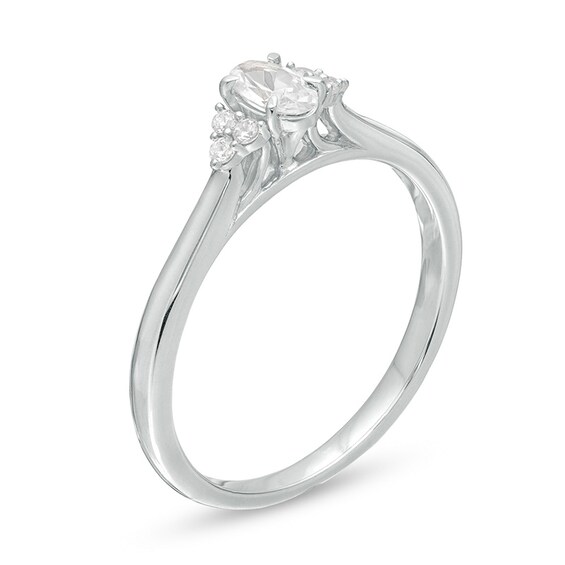 Previously Owned - 3/8 CT. T.w. Oval Diamond Tri-Sides Engagement Ring in 10K White Gold