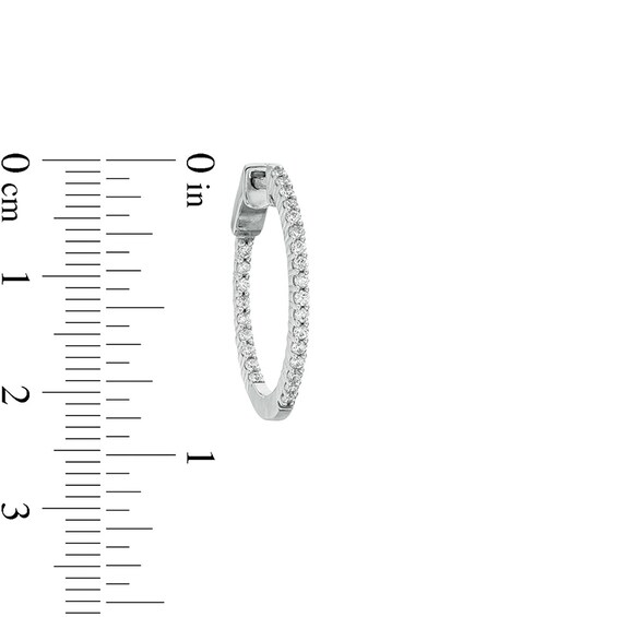 Previously Owned - 1/2 CT. T.w. Diamond Inside-Out Hoop Earrings in 10K White Gold