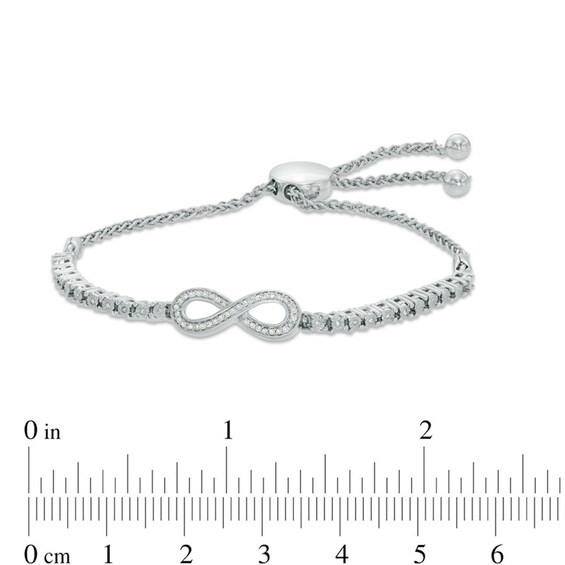 Previously Owned - 1/6 CT. T.w. Diamond Infinity Loop Adjustable Bolo Bracelet in Sterling Silver - 9.5"