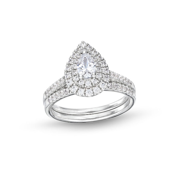 Previously Owned - 1 CT. T.w. Pear-Shaped Diamond Frame Bridal Set in 14K White Gold (I/I1)