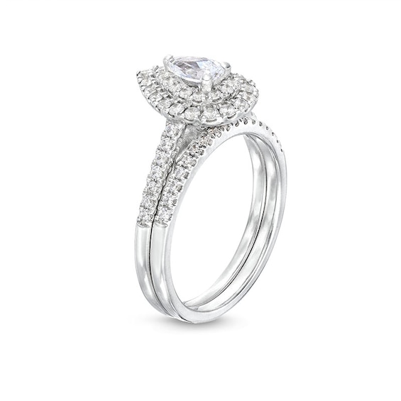 Previously Owned - 1 CT. T.w. Pear-Shaped Diamond Frame Bridal Set in 14K White Gold (I/I1)