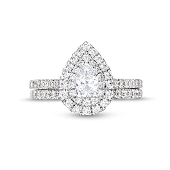 Previously Owned - 1 CT. T.w. Pear-Shaped Diamond Frame Bridal Set in 14K White Gold (I/I1)