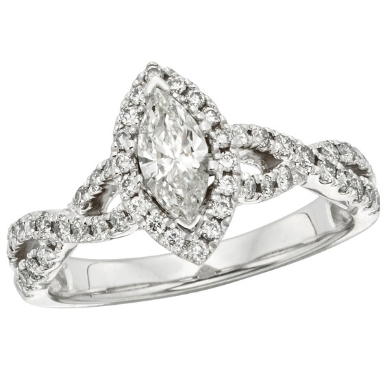 Previously Owned - 1 CT. T.w. Marquise Diamond Frame Twist Shank Engagement Ring in 14K White Gold (I/I1)