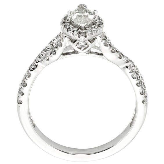 Previously Owned - 1 CT. T.w. Marquise Diamond Frame Twist Shank Engagement Ring in 14K White Gold (I/I1)