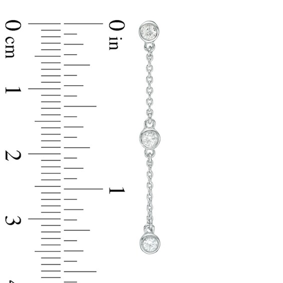 Previously Owned - 1/4 CT. T.w. Diamond Station Three Stone Drop Earrings in 10K White Gold