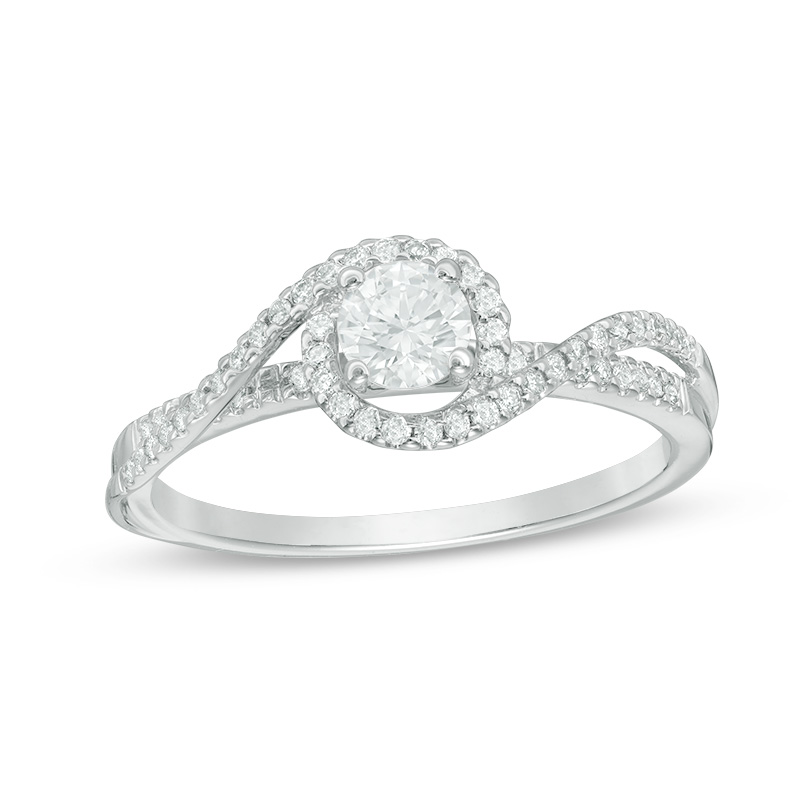Previously Owned - 1/2 CT. T.w. Diamond Swirl Bypass Engagement Ring in 14K White Gold