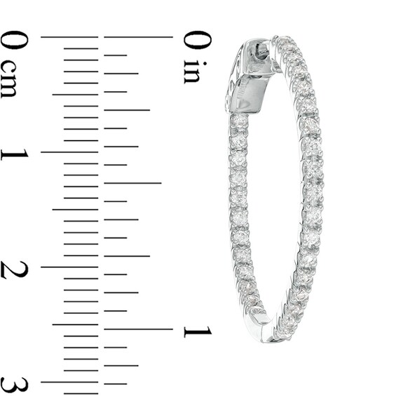 Previously Owned - 1 CT. T.w. Diamond Inside-Out Hoop Earrings in 10K White Gold