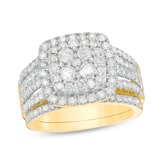 Previously Owned - 1-1/2 CT. T.w. Multi-Diamond Cushion Frame Bridal Set in 10K Gold