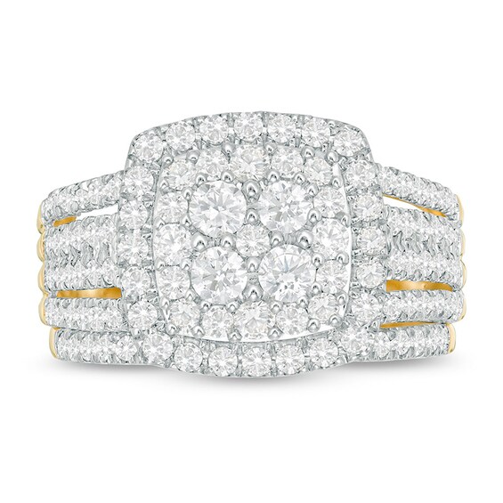 Previously Owned - 1-1/2 CT. T.w. Multi-Diamond Cushion Frame Bridal Set in 10K Gold