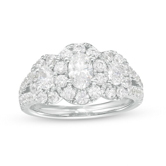 Previously Owned - 2 CT. T.w. Oval Diamond Frame Past Present Future® Split Shank Engagement Ring in 14K White Gold