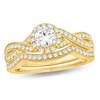 Thumbnail Image 1 of Previously Owned - 3/4 CT. T.W. Diamond Twist Shank Bridal Set in 14K Gold