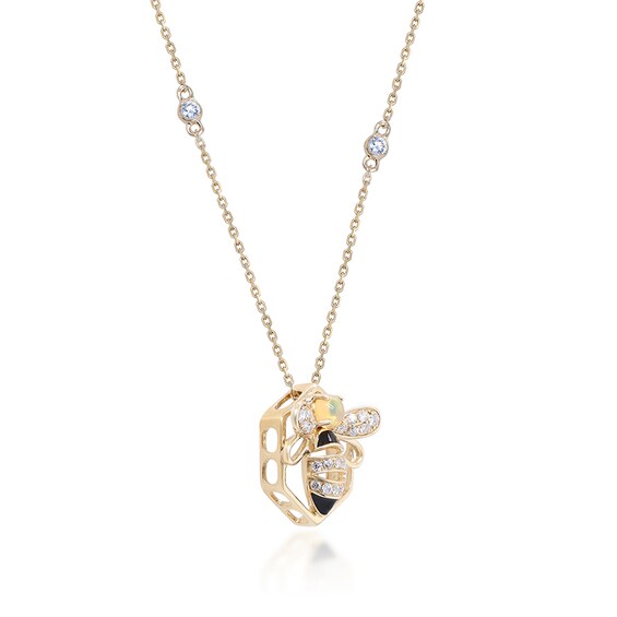 Previously Owned - 3.5mm Opal and 1/5 CT. T.w. Diamond Black Enamel Bee and Honeycomb Outline Pendant in 10K Gold