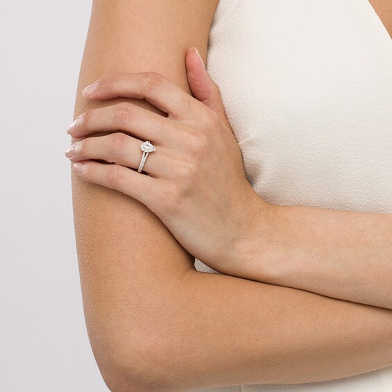 Previously Owned - Celebration Infinite™ 1 CT. T.w. Pear-Shaped Diamond Frame Engagement Ring in 14K White Gold (I/Si2)