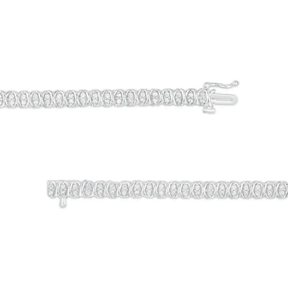 Previously Owned - 1 CT. T.w. Diamond Alternating "Xo" Line Bracelet in 10K White Gold – 7.25"