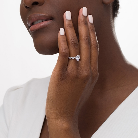 Previously Owned - 2 CT. T.w. Lab-Grown Pear-Shaped Diamond Twist Shank Engagement Ring in 14K White Gold (F/Vs2)