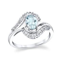 Previously Owned - Oval Aquamarine and 1/3 CT. T.W. Baguette Diamond Frame Bypass Ring in 14K White Gold